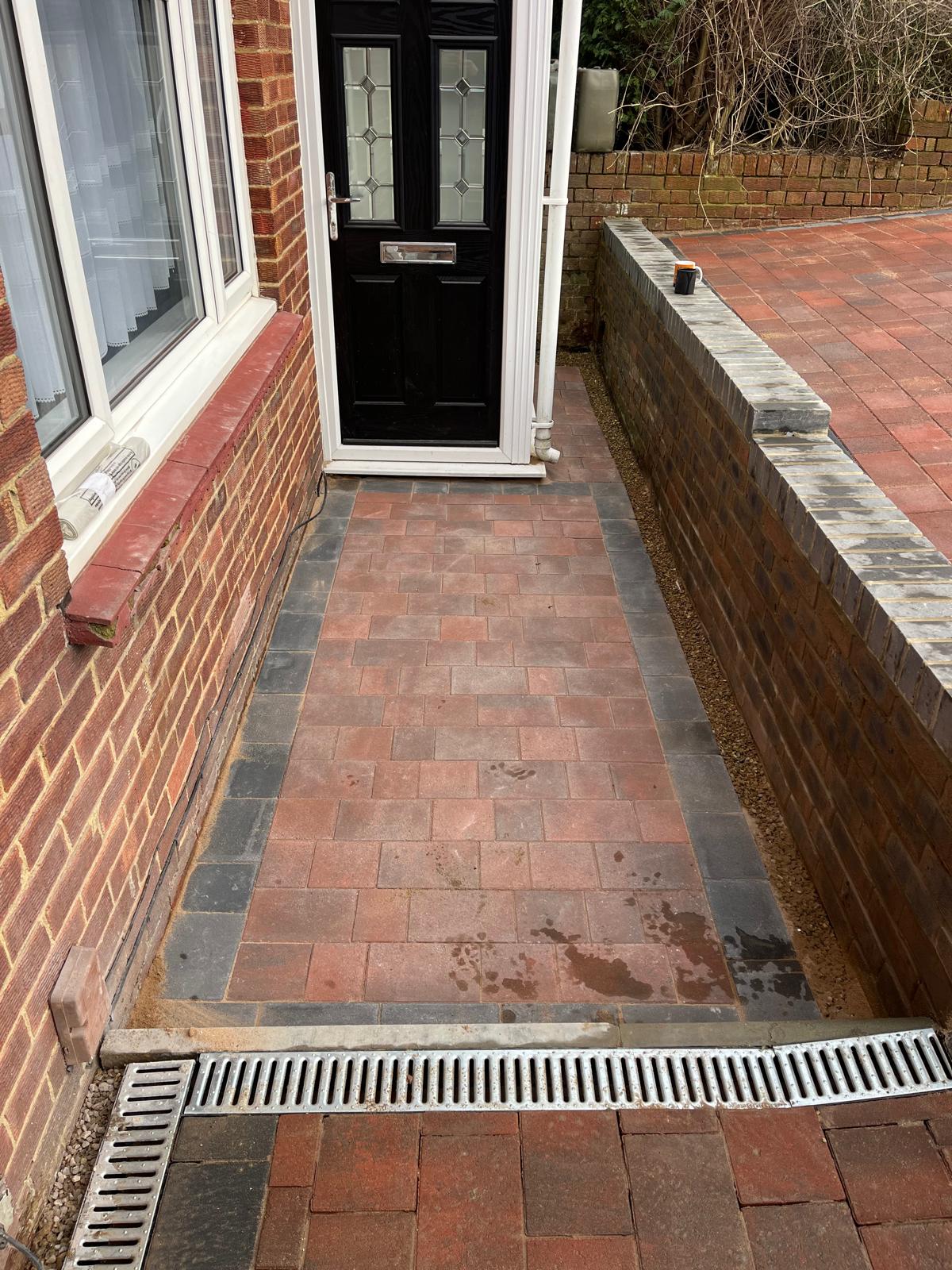 Block paved pathway to front door in Medway with integrated drainage channel