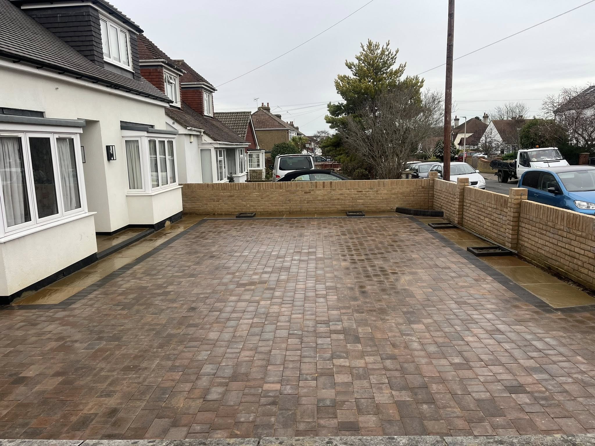 Camel Indian sandstone border on block paving driveway Kent