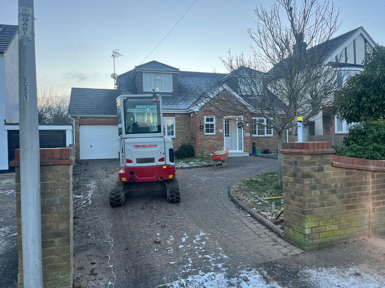 Driveway before transformation to red brick block paving in Rochester