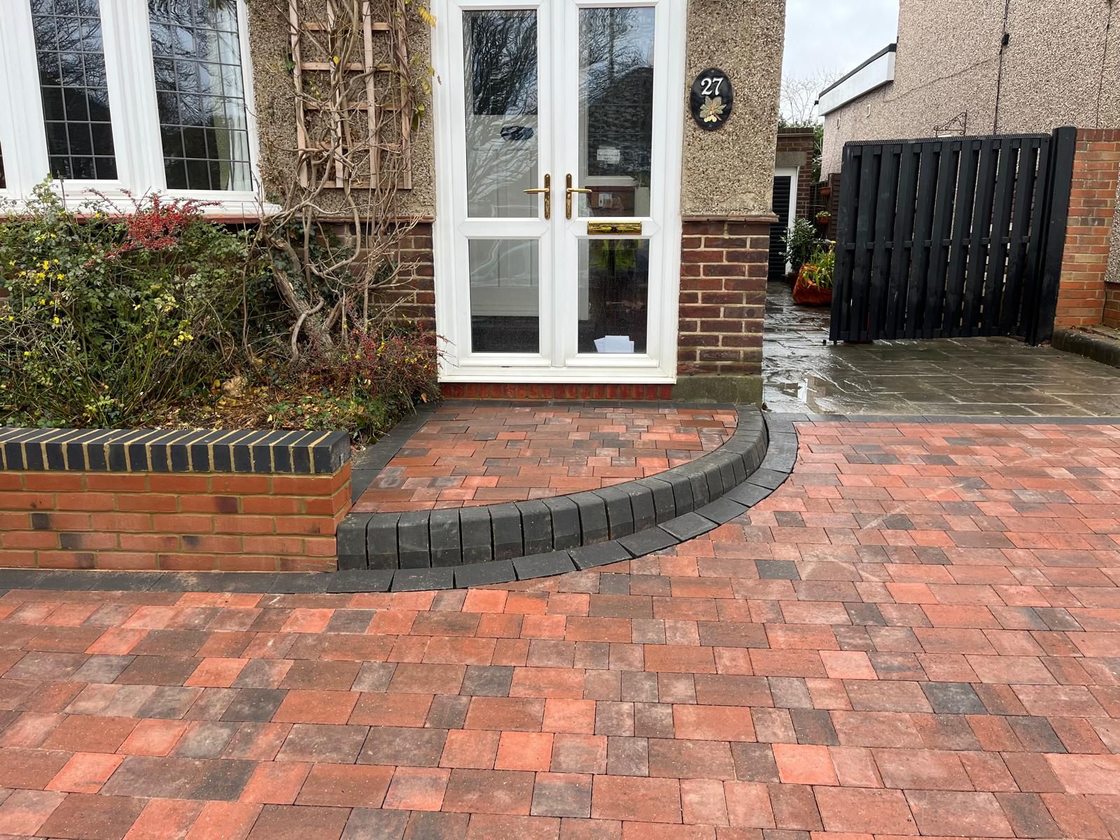 Step access to property from red brick block paving driveway Rochester