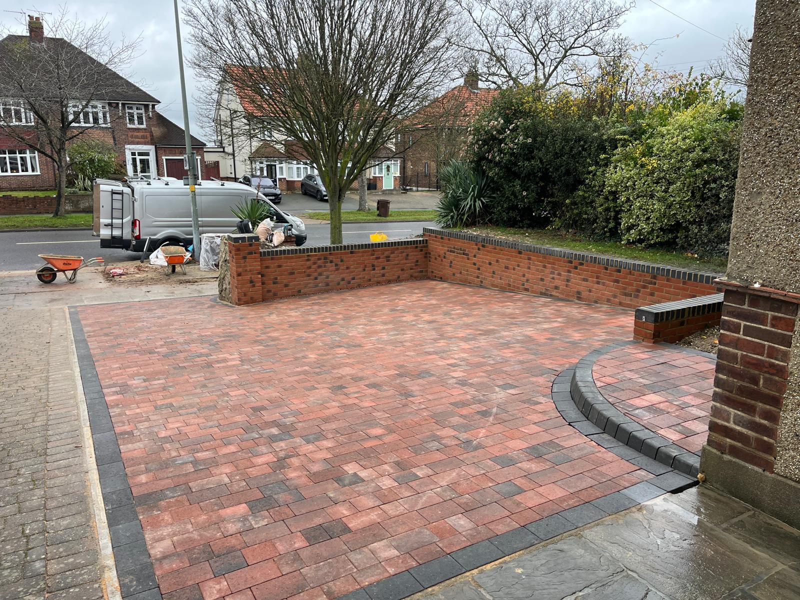 Brick retaining wall for red brick block paving driveway Rochester